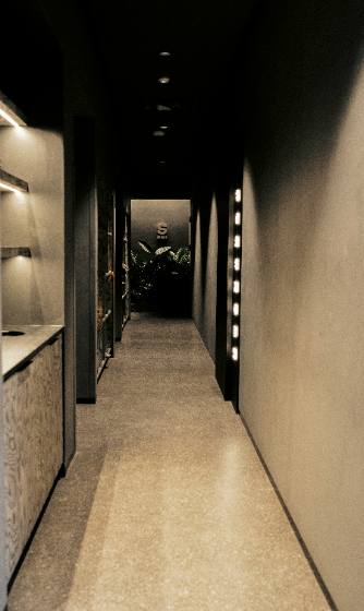 A softly lit studio hallway